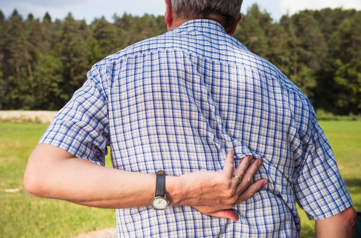 Elderly man with back pain