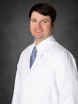 Sanderlin_J_labcoat_web Dr. James B. Sanderlin