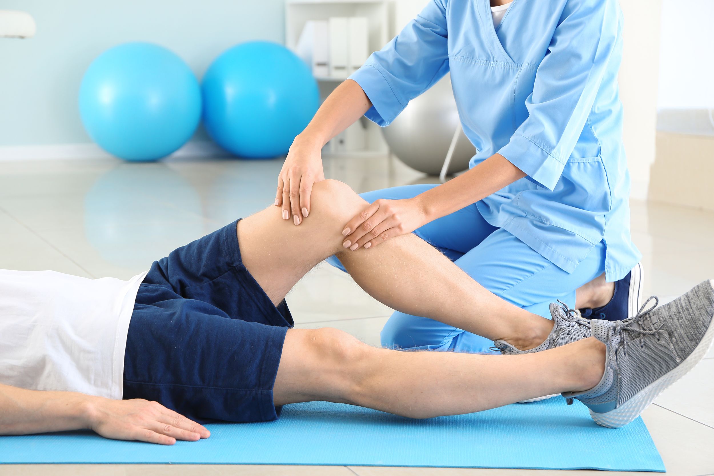 Physical therapist hands-on treatment