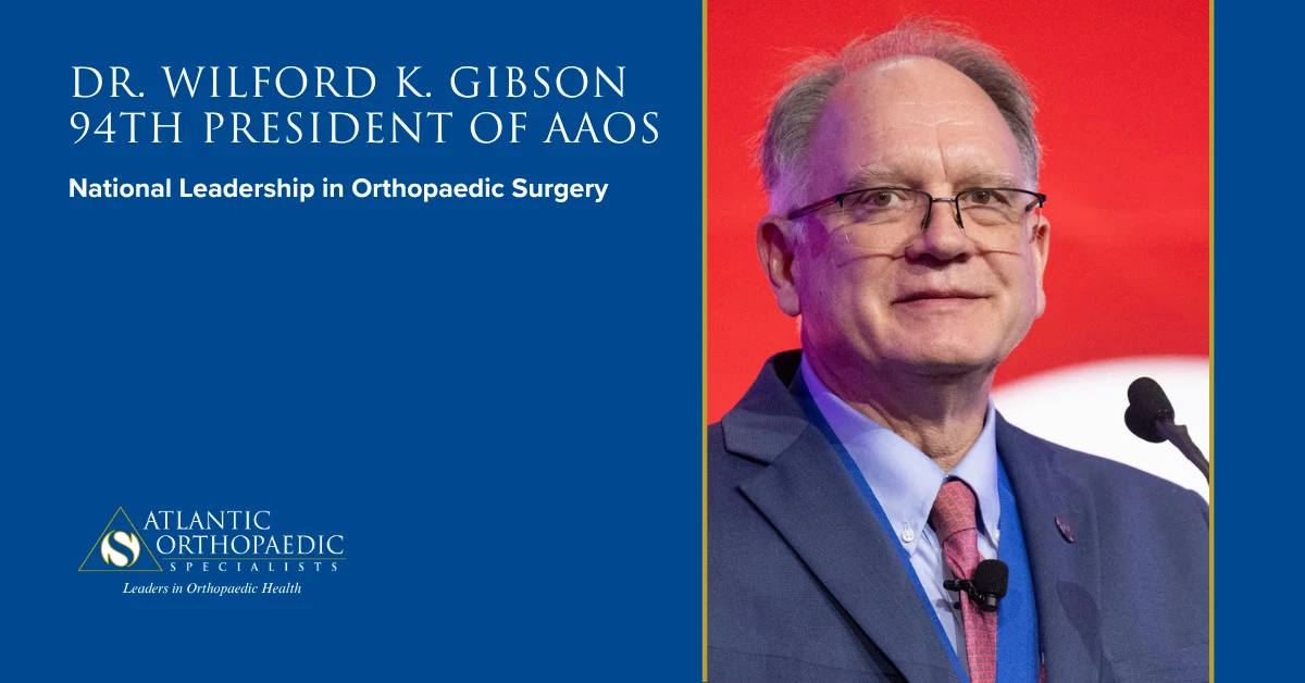 Banner announcing Dr. Wilford K. Gibson as the 94th President of AAOS, with Atlantic Orthopaedic Specialists branding on the left.